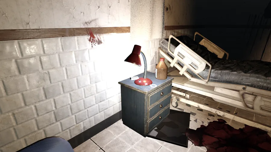 In-game: a bedside table in a patient's room, a medicine bottle under the flashlight beam.